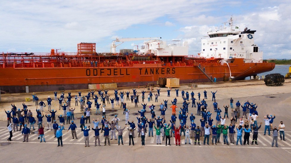 The team from EAS, Flumar and Odfjell gather in front of Bow Atlantic at the EAS shipyard in Brasil.