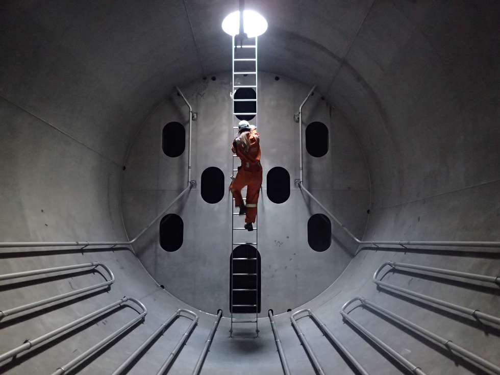 Third mate Camilla Vambeseth inspects a tank on board Odfjell's chemical tanker Bow Summer. Photo by Christian Dahl