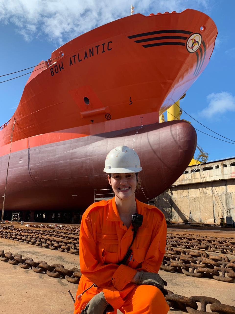 Flumar/Odfjell officer in front of chemical tanker Bow Atlantic